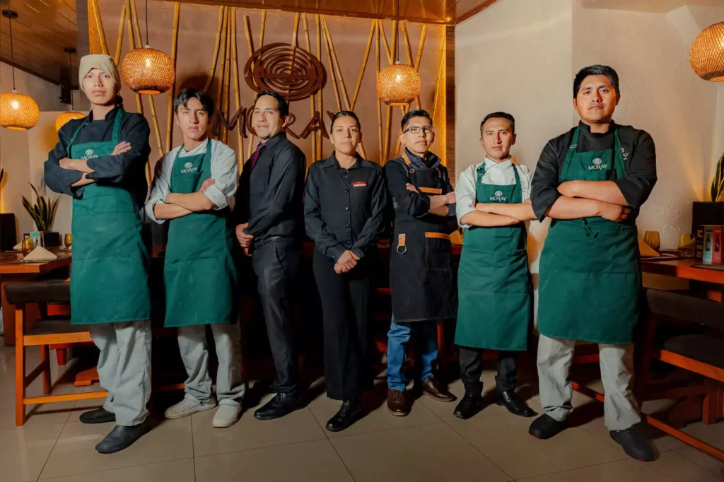 Kitchen and service team of Moray restaurant in Cusco