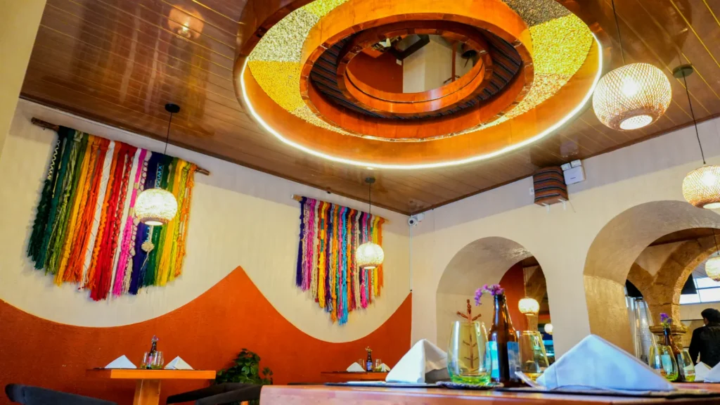 Colorful dining room with Andean textiles at Moray, Cusco